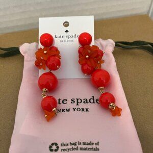 Kate Spade New York orange cluster earrings.